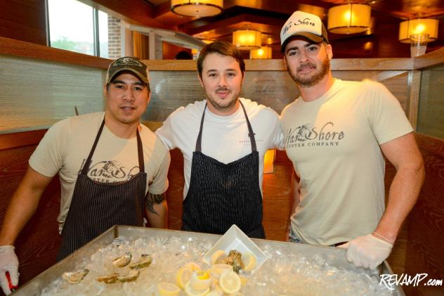 Bourbon Steak Executive Chef Adam Sobel flanked by the team from War Shore Oyster Company.
